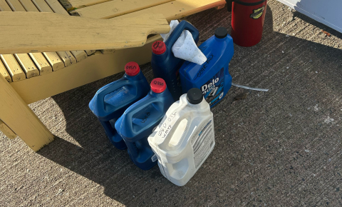 Used oil in jugs