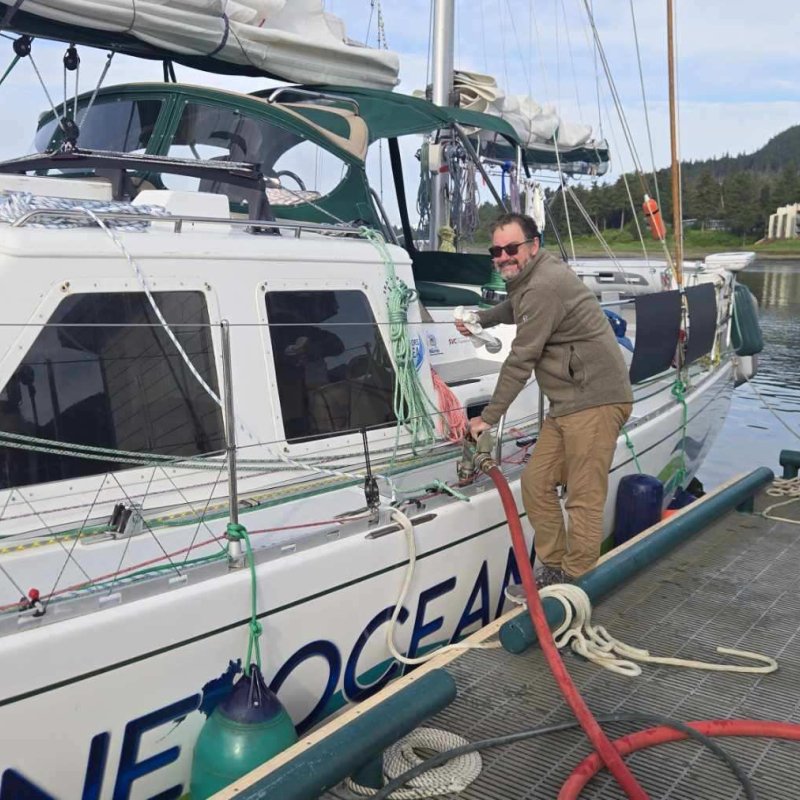 Man fueling a boat