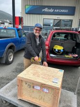 Man opening crate